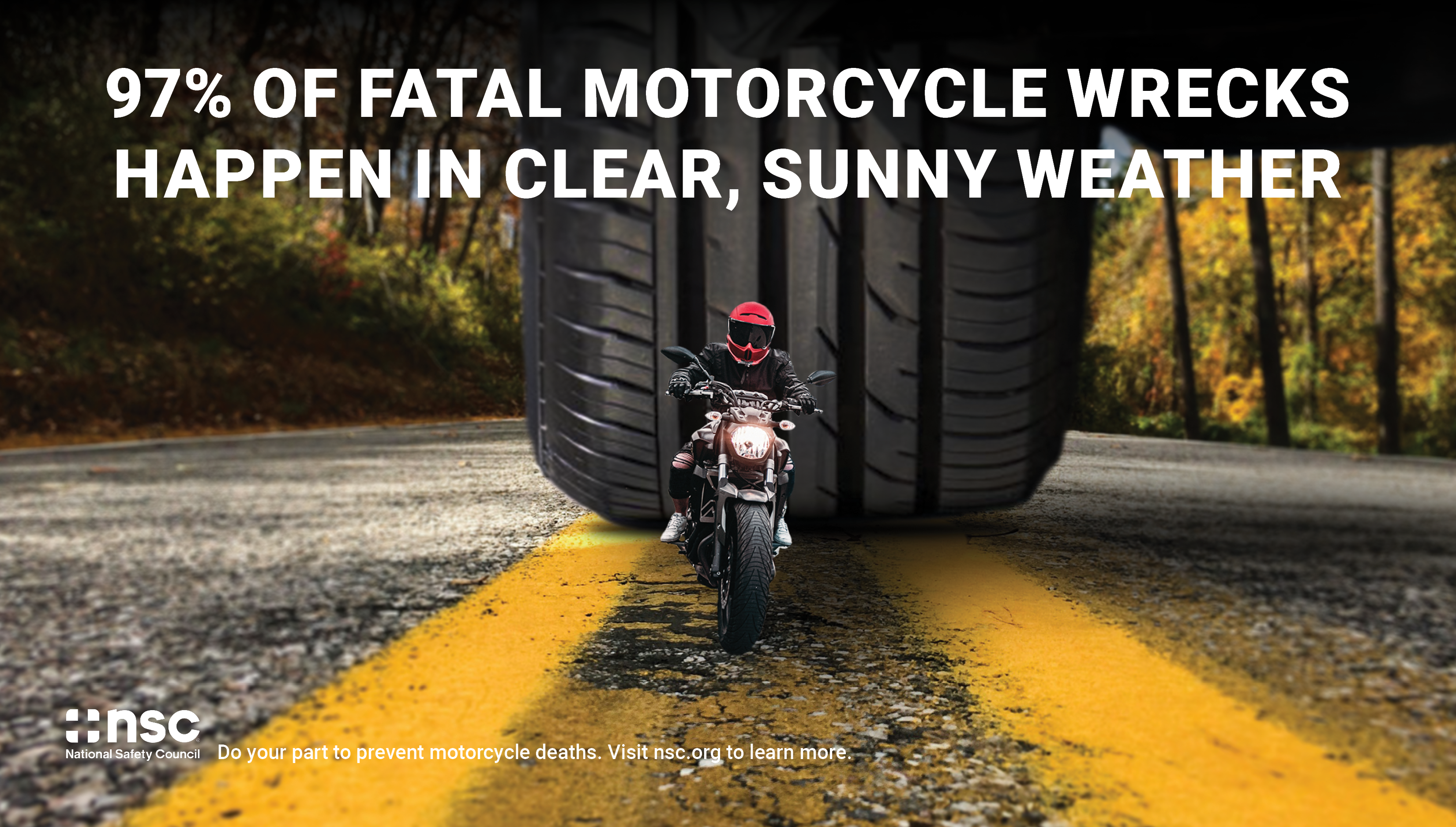 car tire about to run over small motorcyclist